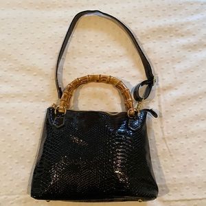 Black faux snakeskin handbag